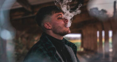 Man vaping in a tunnel