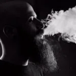 Vape Juice - Blog - Vaping101 - Man smoking vape