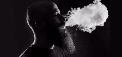 Vape Juice - Blog - Vaping101 - Man smoking vape